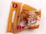 Convenient grab-and-go grilled chicken packaging with a 'HOT' label, showcasing easy microwave-safe meals from www.jcpackaging.net.