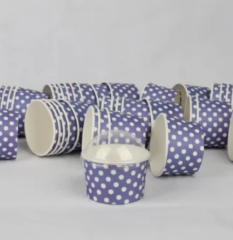 "A collection of medium-sized blue ice cream cups with white polka dots, perfect for serving sweet treats from www.jcpackaging.net."