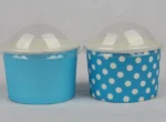 "A collection of medium-sized blue ice cream cups with white polka dots, perfect for serving sweet treats from www.jcpackaging.net."