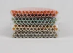 "An assortment of eco-friendly paper straws in various patterns and colors, available at www.jcpackaging.net."