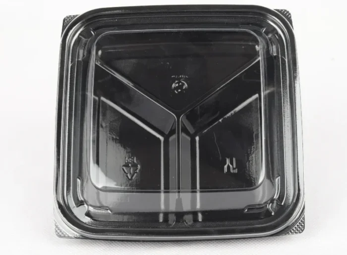 "Versatile black three-compartment food container by JC Packaging, perfect for meal prep and storage."